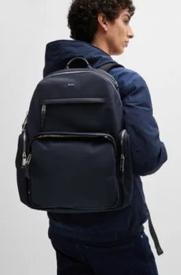 Structured-material backpack with logo and two-way zip